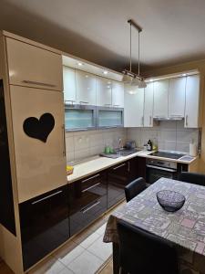 Η κουζίνα ή μικρή κουζίνα στο Milana centar