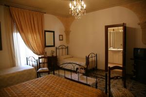 A bed or beds in a room at Calì Nitta Még 17 kép
