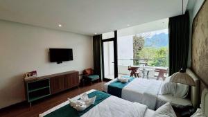 TV a/nebo společenská místnost v ubytování Sunrise Mountain View Resort