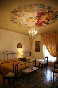 A bed or beds in a room at Calì Nitta