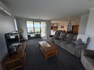 Χώρος καθιστικού στο Cozy Crescent