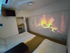 Postel nebo postele na pokoji v ubytování Hostel Belle Via Tokyo