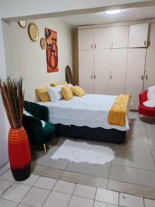 Ένα ή περισσότερα κρεβάτια σε δωμάτιο στο Sunset Inn