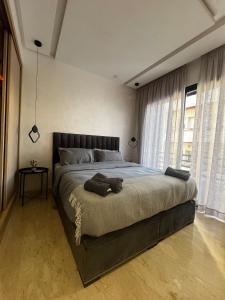 Postel nebo postele na pokoji v ubytování Special CAN à 1 min du stade Mohamed 5