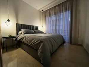 Postel nebo postele na pokoji v ubytování Special CAN à 1 min du stade Mohamed 5