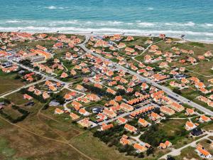 an aerial view of a residential area next to the ocean at 6 person holiday home in Skagen in Skagen