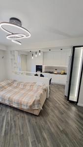 Ένα ή περισσότερα κρεβάτια σε δωμάτιο στο Полёт