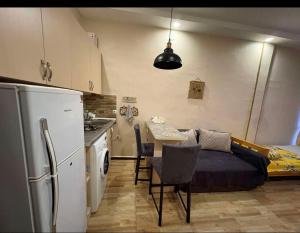 Kuchyň nebo kuchyňský kout v ubytování Tamar's Apartment