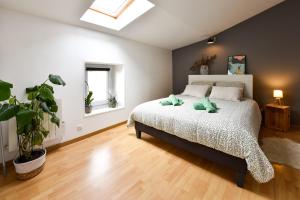 Postel nebo postele na pokoji v ubytování L'Échappée Niortaise by CozyLife