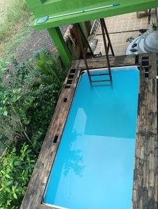 an overhead view of a blue swimming pool at Palmquist Villa in Neral