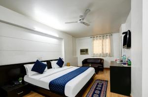 Postel nebo postele na pokoji v ubytování Sweet Home Lodge