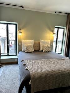 Postel nebo postele na pokoji v ubytování Côté Nuit