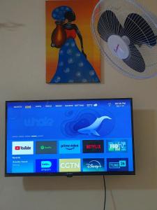 Μια τηλεόραση ή/και κέντρο ψυχαγωγίας στο Sunset Inn +19 φωτογραφίες