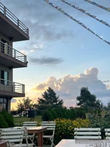 a view of a patio with chairs and a table at Sherpa Hills in Kathmandu