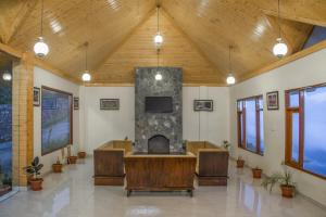 Posezení v ubytování Echor - The Koti Village Resort Kufri