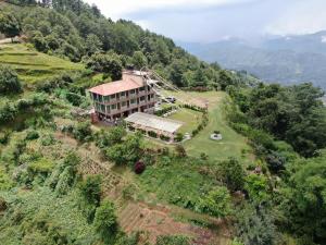 an aerial view of a house on a hill at Sherpa Hills in Kathmandu