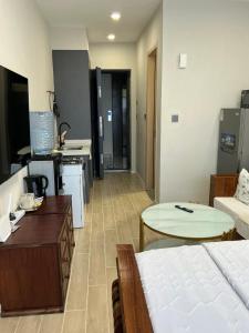 TV a/nebo společenská místnost v ubytování Mimah's cozy getaway near JKIA at Taurus Residences