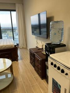 Kuchyň nebo kuchyňský kout v ubytování Mimah's cozy getaway near JKIA at Taurus Residences