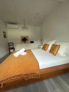 Ένα ή περισσότερα κρεβάτια σε δωμάτιο στο Le Trésifontain