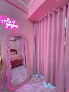 Una cama o camas en una habitación de SMDC Style Residences Condotel