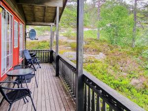 En balkon eller terrasse på 6 person holiday home in ÅSERAL-By Traum + 27 billeder