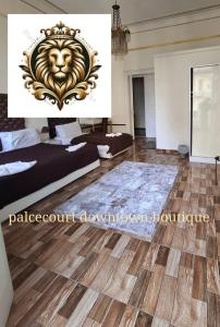 Ένα ή περισσότερα κρεβάτια σε δωμάτιο στο Qasr court +10 φωτογραφίες