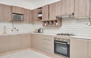 Η κουζίνα ή μικρή κουζίνα στο Mawi Homes