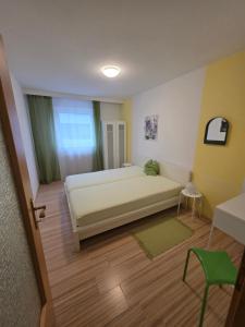 Postel nebo postele na pokoji v ubytování Ferienwohnung Nagy