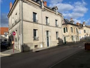 an old building on the side of a street at chez Alain et Sylvie in Braine