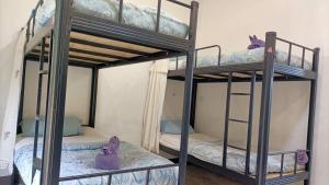 Postel nebo postele na pokoji v ubytování LUCKY PAI Resort&Hostel + 14 fotografií