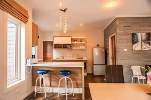 Η κουζίνα ή μικρή κουζίνα στο ZJ Garden Pool Villa