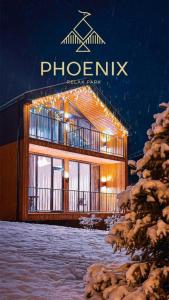 a building with a sign that says photography on it at Phoenix Relax Park in Bukovel