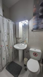 Koupelna v ubytování MG Boho Apartment