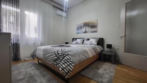 Postel nebo postele na pokoji v ubytování MG Boho Apartment