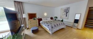 a bedroom with a bed and a dresser and a television at Villa 9- luxurious 5 bedrooms villa in the heart of Ambassadors in Rabat +10 photos