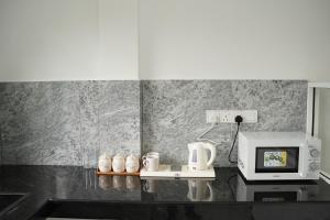 Η κουζίνα ή μικρή κουζίνα στο Meadow Villa