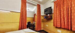 Μια τηλεόραση ή/και κέντρο ψυχαγωγίας στο Hotel Manorama