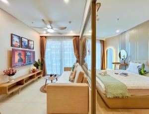 Ένα ή περισσότερα κρεβάτια σε δωμάτιο στο Căn Hộ Biển The Sóng Vũng Tàu - Condotel Seaside Homestay +78 φωτογραφίες