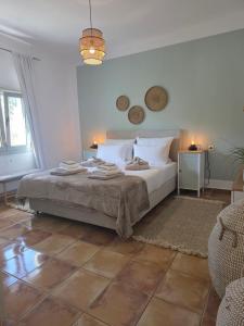 Postel nebo postele na pokoji v ubytování Pelekanos Apartment