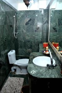 Koupelna v ubytování Appartement Acces Plage + 35 fotografií