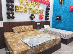 Una cama o camas en una habitación de New Anant Guest House