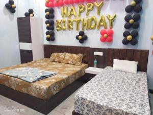 Una cama o camas en una habitación de New Anant Guest House