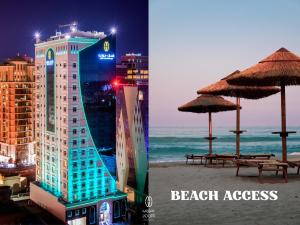 a hotel on the beach next to a beach with an umbrella at Jouri a Murwab hotel Doha in Doha