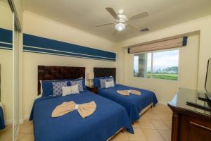 Giường trong phòng chung tại Del Mar 2A 3 bdr Ocean View in Los Suenos +39 ảnh