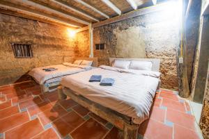 ドン・ヴァンにあるSa Mộc homeの部屋にベッドが2つある寝室 +17枚の写真