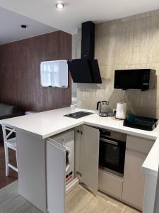 Η κουζίνα ή μικρή κουζίνα στο Апартаменти ЖК "Сонячний Квартал"