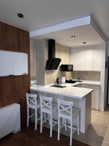 Η κουζίνα ή μικρή κουζίνα στο Апартаменти ЖК "Сонячний Квартал"