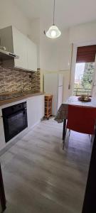 Kuchyň nebo kuchyňský kout v ubytování Raggio di Sole