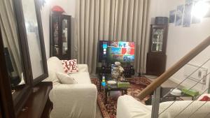 Μια τηλεόραση ή/και κέντρο ψυχαγωγίας στο Chic & Central Liverpool Flat