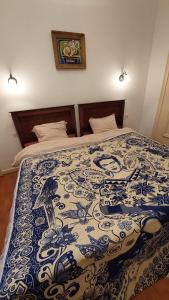 Ένα ή περισσότερα κρεβάτια σε δωμάτιο στο Maison Chez Grand-mère, Route des vins